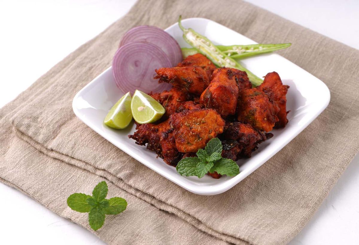 Fresh and spicy chicken dish in a plate